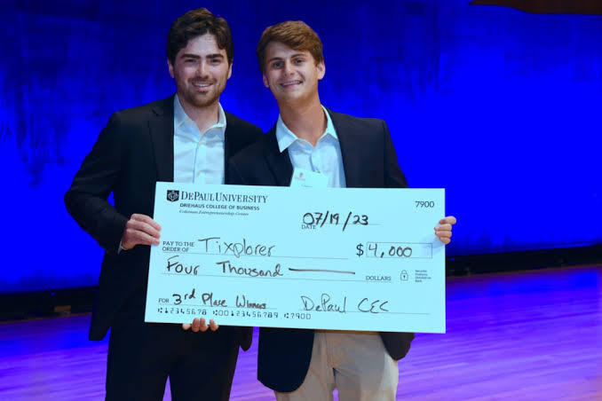 Cameron Roth holding a $4,000 third-place check from the DePaul Coleman Entrepreneurship Center, July 2023