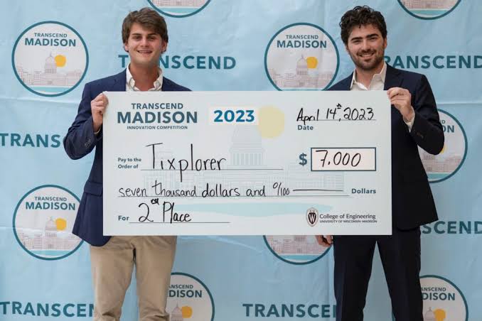 Cameron Roth holding a $7,000 second-place check at the Transcend Madison Innovation Competition, April 2023